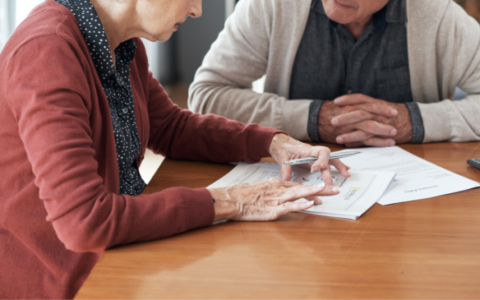 Trusts in Texas couple sitting at table with paperwork