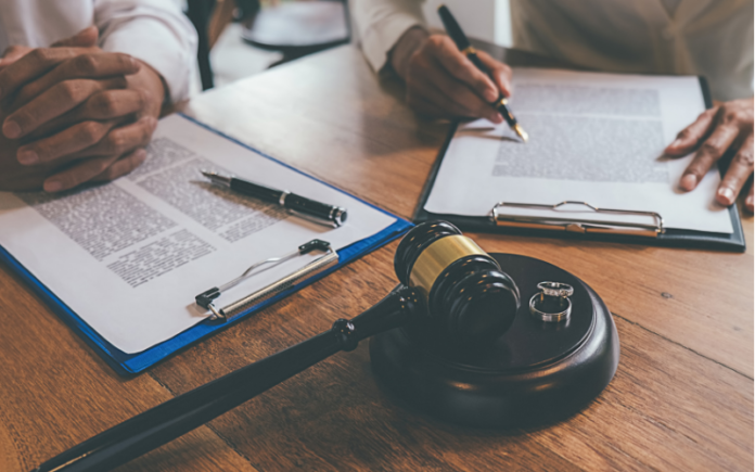 Divorce triggers automatic revocations paperwork on a table