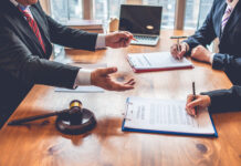 Litigate or Mediate – How About Both? business people and lawyers discussing contract papers.Legal planning. Concepts of law, advice, legal services